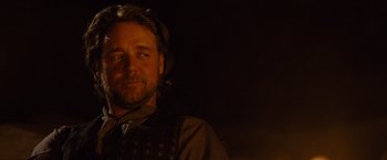 Movie still from “3:10 to Yuma” (2007), directed by James Mangold – A person wearing a vest; Close Up shot, Over the shoulder angle