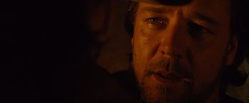 Movie still from “3:10 to Yuma” (2007), directed by James Mangold – A person with a hat on; Close Up shot, Over the shoulder angle