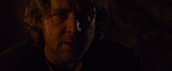 Movie still from “3:10 to Yuma” (2007), directed by James Mangold – A person looking at the camera; Close Up shot, Over the shoulder angle