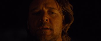 Movie still from “3:10 to Yuma” (2007), directed by James Mangold – A person with long hair; Close Up shot, Low angle