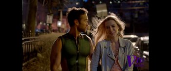 Movie still from “The Boys” (2019), created by Eric Kripke – A man and a woman walking down a street; Medium shot, Over the shoulder angle