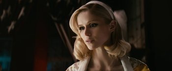 Movie still from “The Boys” (2019), created by Eric Kripke – A woman with blonde hair wearing a white dress; Close Up shot, Low angle