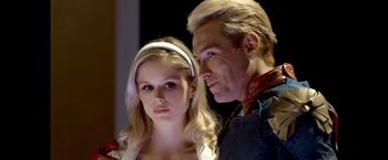 Movie still from “The Boys” (2019), created by Eric Kripke – A man and a woman standing next to each other; Close Up shot, Low angle