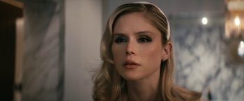 Movie still from “The Boys” (2019), created by Eric Kripke – A person with long blonde hair; Close Up shot, Over the shoulder angle