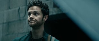 Movie still from “The Boys” (2019), created by Eric Kripke – A person with a beard looking up; Close Up shot, Over the shoulder angle