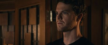 Movie still from “The Boys” (2019), created by Eric Kripke – A person looking at the camera; Close Up shot, Over the shoulder angle