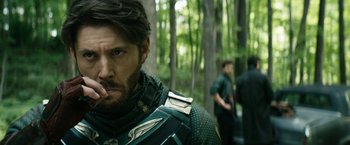 Movie still from “The Boys” (2019), created by Eric Kripke – A person wearing a suit of armor; Close Up shot, Over the shoulder angle