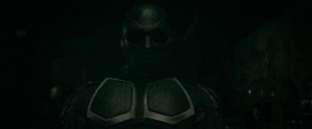 Movie still from “The Boys” (2019), created by Eric Kripke – A man's face in a dark room; Close Up shot, Low angle