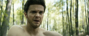 Movie still from “The Boys” (2019), created by Eric Kripke – A person with no shirt; Close Up shot, Over the shoulder angle