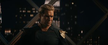 Movie still from “The Boys” (2019), created by Eric Kripke – A person wearing a costume; Close Up shot, Over the shoulder angle