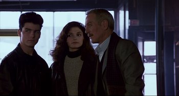 Movie still from “The Color of Money” (1986), directed by Martin Scorsese – A man and a woman standing next to each other; Medium shot, Over the shoulder angle