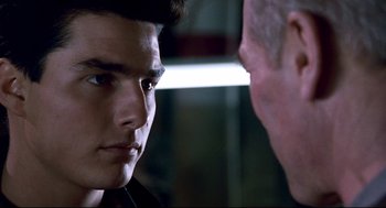 Movie still from “The Color of Money” (1986), directed by Martin Scorsese – A man and a woman face to face in a room; Close Up shot, Over the shoulder angle