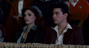 Movie still from “The Color of Money” (1986), directed by Martin Scorsese – A man and a woman sitting next to each other; Medium shot, Over the shoulder angle
