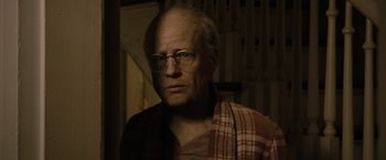 Movie still from “The Curious Case of Benjamin Button” (2008), directed by David Fincher – An older man wearing glasses and a plaid blanket; Close Up shot, Low angle