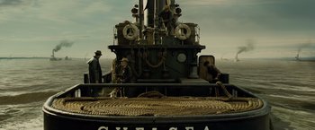 Movie still from “The Curious Case of Benjamin Button” (2008), directed by David Fincher – A large boat with ropes on top of the deck; Wide shot, Low angle