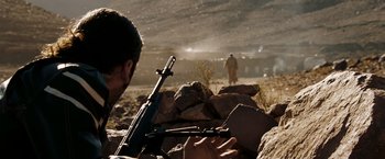 Movie still from “Body of Lies” (2008), directed by Ridley Scott – Medium shot, Over the shoulder angle