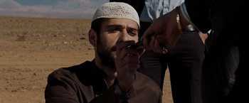 Movie still from “Body of Lies” (2008), directed by Ridley Scott – Close Up shot, Over the shoulder angle