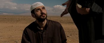 Movie still from “Body of Lies” (2008), directed by Ridley Scott – Close Up shot, Over the shoulder angle