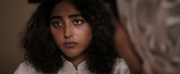 Movie still from “Body of Lies” (2008), directed by Ridley Scott – Close Up shot, Over the shoulder angle