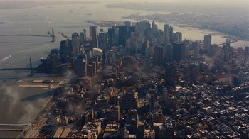 Movie still from “The Dark Knight Rises” (2012), directed by Christopher Nolan – An aerial view of a large city in the middle of the day; Extreme Wide shot, Overhead angle