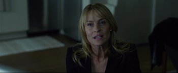 Movie still from “The Girl with the Dragon Tattoo” (2011), directed by David Fincher – A person with long hair; Close Up shot, Over the shoulder angle