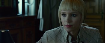 Movie still from “The Girl with the Dragon Tattoo” (2011), directed by David Fincher – A person with short blonde hair; Close Up shot, Over the shoulder angle