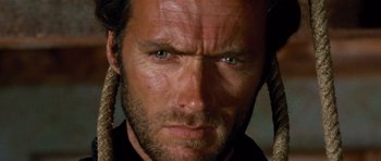 Movie still from “The Good, the Bad and the Ugly” (1966), directed by Sergio Leone – A man's eyes and hair; Close Up shot, Low angle