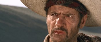 Movie still from “The Good, the Bad and the Ugly” (1966), directed by Sergio Leone – A person wearing a hat; Close Up shot, Low angle