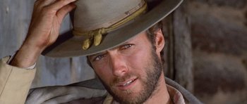 Movie still from “The Good, the Bad and the Ugly” (1966), directed by Sergio Leone – A person wearing a hat; Close Up shot, Low angle