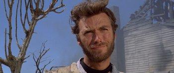 Movie still from “The Good, the Bad and the Ugly” (1966), directed by Sergio Leone – A person with a beard; Close Up shot, Low angle