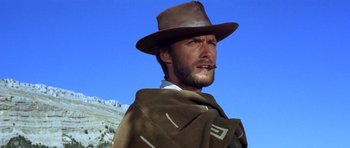 Movie still from “The Good, the Bad and the Ugly” (1966), directed by Sergio Leone – A person wearing a hat; Close Up shot, Low angle