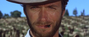 Movie still from “The Good, the Bad and the Ugly” (1966), directed by Sergio Leone – A person wearing a hat; Close Up shot, Low angle