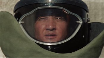 Movie still from “The Hurt Locker” (2008), directed by Kathryn Bigelow – A person wearing a motorcycle helmet; Close Up shot, Low angle