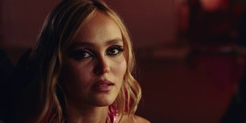 Movie still from “The Idol” (2023), directed by Sam Levinson – A person wearing makeup; Close Up shot, Over the shoulder angle