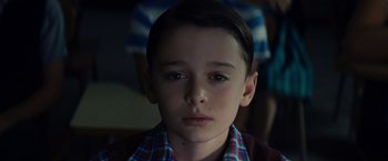 Movie still from “Bridge of Spies” (2015), directed by Steven Spielberg – A young boy is looking at the camera; Close Up shot, High angle