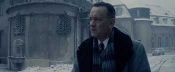 Movie still from “Bridge of Spies” (2015), directed by Steven Spielberg – A man wearing a scarf and a tie; Close Up shot, Over the shoulder angle