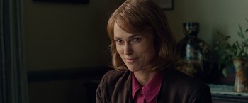 Movie still from “The Imitation Game” (2014), directed by Morten Tyldum – A person wearing a jacket; Close Up shot, Over the shoulder angle