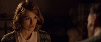 Movie still from “The Imitation Game” (2014), directed by Morten Tyldum – A person wearing a sweater; Close Up shot, Over the shoulder angle