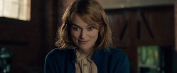 Movie still from “The Imitation Game” (2014), directed by Morten Tyldum – A person with short hair; Close Up shot, Over the shoulder angle