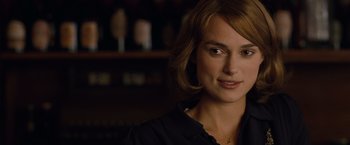 Movie still from “The Imitation Game” (2014), directed by Morten Tyldum – A person wearing a black shirt; Close Up shot, Over the shoulder angle