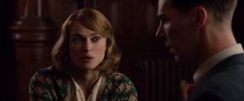 Movie still from “The Imitation Game” (2014), directed by Morten Tyldum – A man and a woman are looking at each other; Close Up shot, Over the shoulder angle
