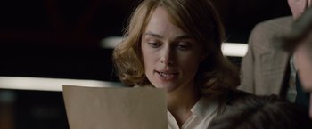Movie still from “The Imitation Game” (2014), directed by Morten Tyldum – A person using a laptop computer; Close Up shot, Over the shoulder angle
