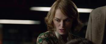 Movie still from “The Imitation Game” (2014), directed by Morten Tyldum – A person wearing a jacket; Close Up shot, Over the shoulder angle