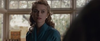 Movie still from “The Imitation Game” (2014), directed by Morten Tyldum – A person wearing a blue shirt; Close Up shot, Over the shoulder angle