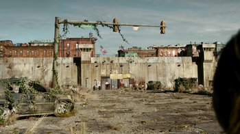 Movie still from “The Last of Us” (2023), created by Neil Druckmann – An abandoned street in the middle of a city; Extreme Wide shot, High angle