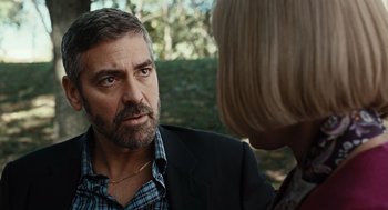 Movie still from “Burn After Reading” (2008), directed by Joel Coen – A person talking to another person; Close Up shot, Over the shoulder angle