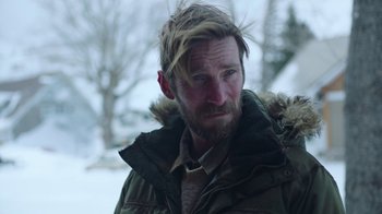 Movie still from “The Last of Us” (2023), created by Neil Druckmann – A person wearing a jacket; Close Up shot, Over the shoulder angle