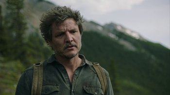 Movie still from “The Last of Us” (2023), created by Neil Druckmann – A person wearing a shirt; Close Up shot, Over the shoulder angle