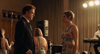 Movie still from “The Lobster” (2015), directed by Yorgos Lanthimos – A man and a woman standing next to each other; Medium shot, Over the shoulder angle