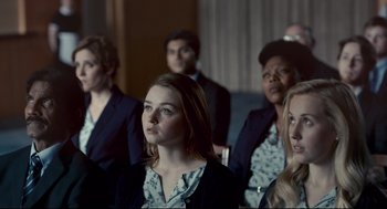 Movie still from “The Lobster” (2015), directed by Yorgos Lanthimos – A group of young people sitting in a room; Medium shot, Over the shoulder angle